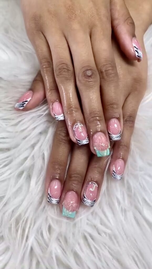 Yellow french tip nails with daisy nail art at Eternal Nails Southdale Road London